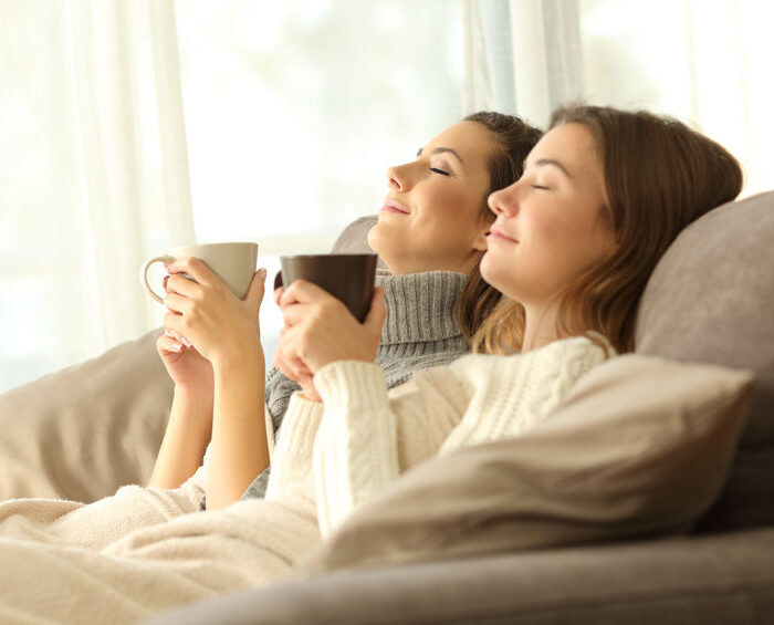 Relaxed roommates in winter at home